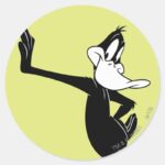 DAFFY DUCK™ Leaning Against A Wall Classic Round Sticker