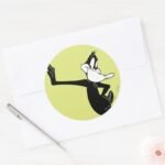 DAFFY DUCK™ Leaning Against A Wall Classic Round Sticker