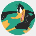 DAFFY DUCK™ Swinging A Punch Classic Round Sticker