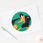 DAFFY DUCK™ Swinging A Punch Classic Round Sticker