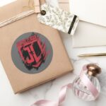 Justice League Brushed Paint JL Shield Classic Round Sticker