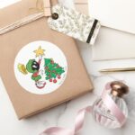 MARVIN THE MARTIAN™ Putting Star On Tree Classic Round Sticker