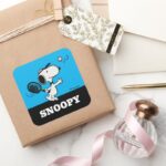 Peanuts Snoopy Plays Tennis Square Sticker