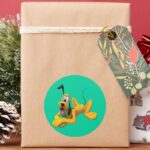 Pluto Laying With Ear Up Classic Round Sticker