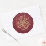 Red HOGWARTS™ Crest Holiday Wreath Classic Round Sticker