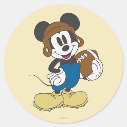 Sporty Mickey Holding Football Classic Round Sticker