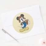 Sporty Mickey Holding Football Classic Round Sticker