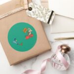 WILE E. COYOTE™ And ROAD RUNNER™ ACME Rocket Classic Round Sticker